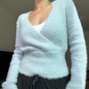 NWT Fuzzy light blue crossover sweater